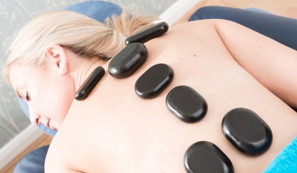 Hot stone massage soothes sore muscles